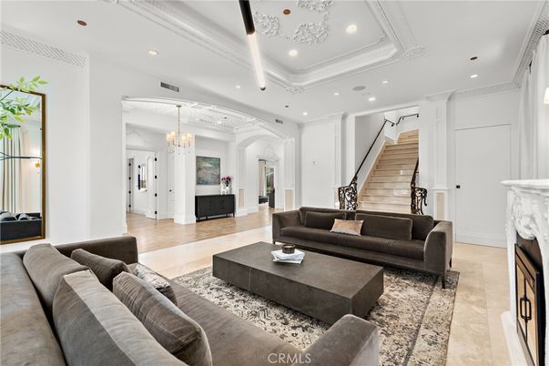 Chandelier, Fireplace, Interior, Living room, Recessed Lighting, Wood Texture Flooring