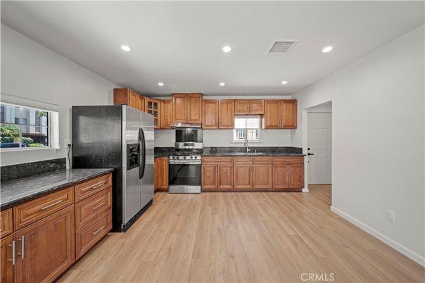Interior, Kitchen, Recessed Lighting, Stainless Steel Appliances, Wood Texture Flooring