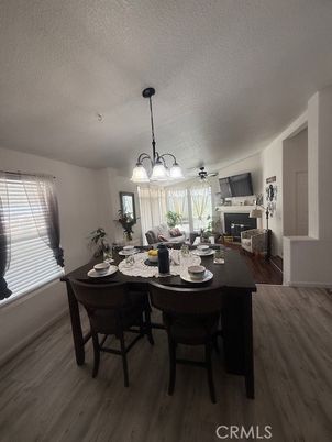 Chandelier, Dining room, Fireplace, Interior, Wood Texture Flooring
