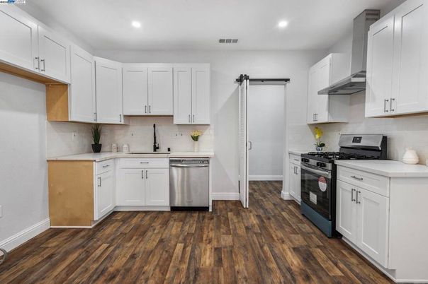 Interior, Kitchen, Recessed Lighting, Stainless Steel Appliances, Wood Texture Flooring