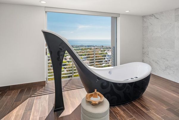 Bathroom, Free Standing Baths, Interior, Marble Walls, Recessed Lighting, Water, Wood Texture Flooring