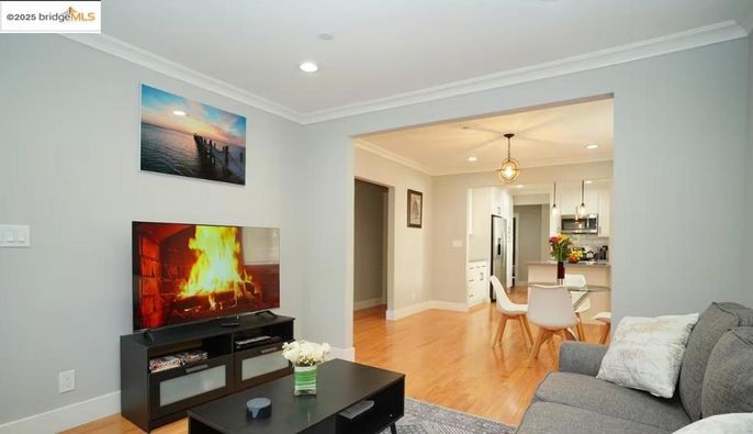 Dining room, Interior, Kitchen, Living room, Pendant Lights, Recessed Lighting, Stainless Steel Appliances, Wood Texture Flooring