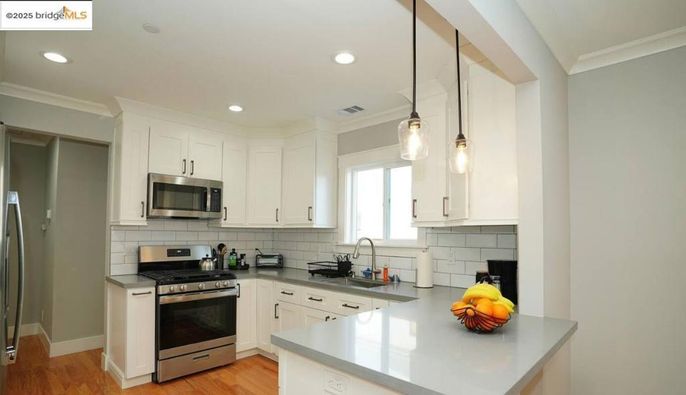 Interior, Kitchen, Pendant Lights, Recessed Lighting, Stainless Steel Appliances, Wood Texture Flooring