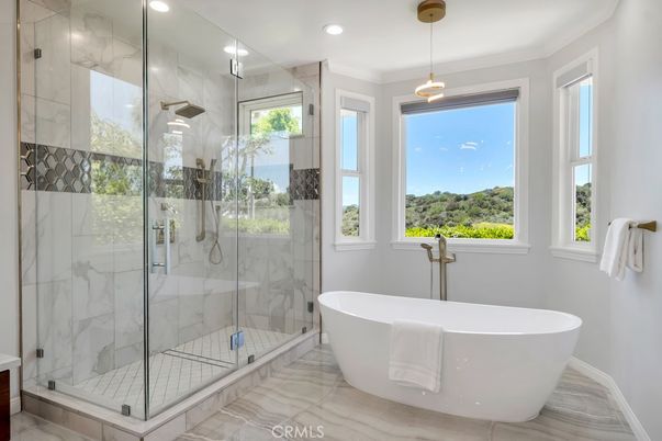 Bathroom, Free Standing Baths, Glass Shower, Interior, Marble Walls, Pendant Lights, Recessed Lighting