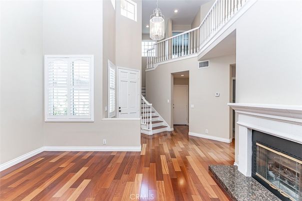 Fireplace, Interior, Pendant Lights, Recessed Lighting, Wood Texture Flooring