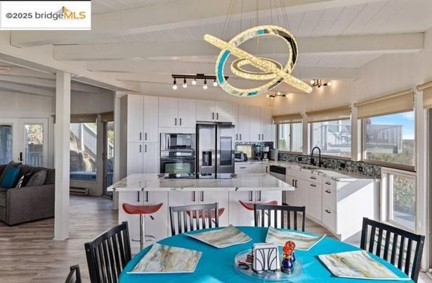 Dining room, Interior, Kitchen, Living room, Pendant Lights, Stainless Steel Appliances, Wood Texture Flooring