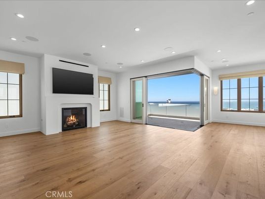 Empty room, Fireplace, Interior, Recessed Lighting, Water, Wood Texture Flooring