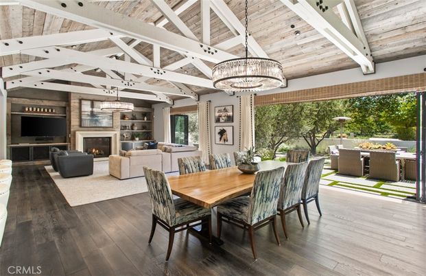 Chandelier, Dining room, Fireplace, Interior, Living room, Pendant Lights, Wooden Ceilings, Wood Texture Flooring