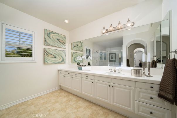 Bathroom, Dual Sink Vanities, Interior, Recessed Lighting, Tile Countertops