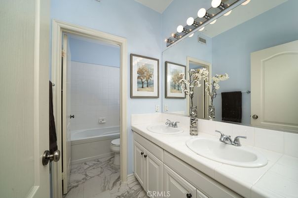 Bathroom, Dual Sink Vanities, Interior, Marble, Tile Countertops