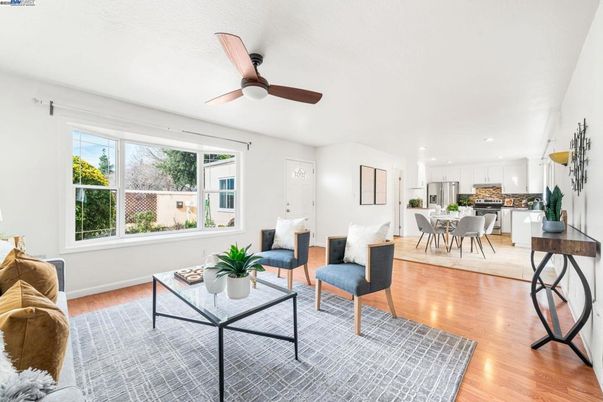 Dining room, Interior, Kitchen, Living room, Recessed Lighting, Stainless Steel Appliances, Wood Texture Flooring