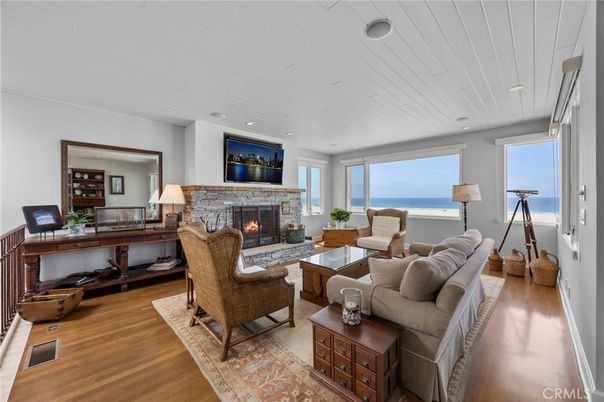 Fireplace, Interior, Living room, Recessed Lighting, Water, Wood Texture Flooring