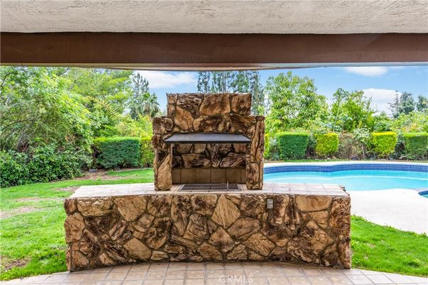 Exterior, Fireplace, Pool