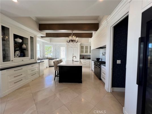 Chandelier, Dining room, Interior, Kitchen, Recessed Lighting, Stainless Steel Appliances, Wooden Beams