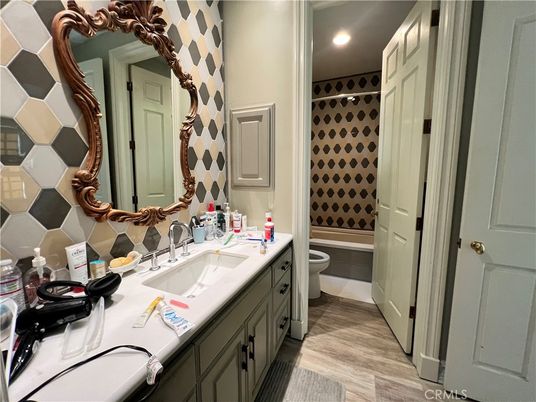 Bathroom, Dual Sink Vanities, Interior, Recessed Lighting, Wood Texture Flooring