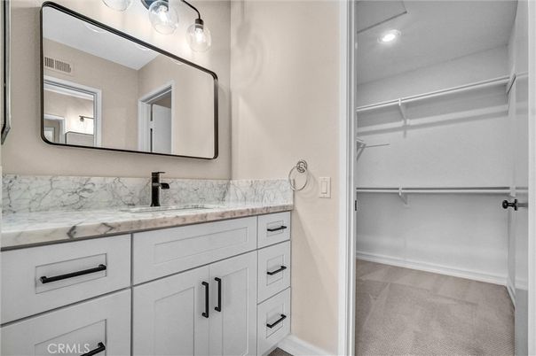 Bathroom, Dual Sink Vanities, Interior, Recessed Lighting, Walk-in Closets