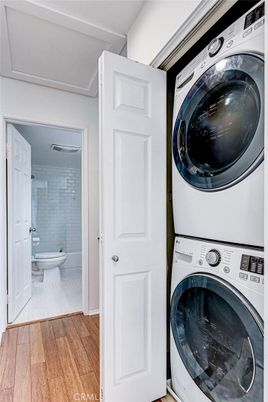 Bathroom, Interior, Utility Closets, Washer, Wood Texture Flooring