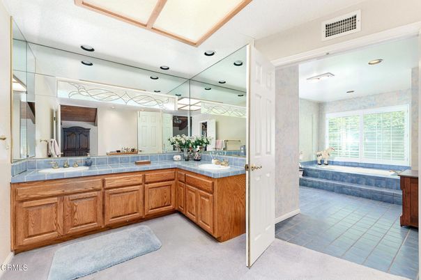 Bathroom, Dual Sink Vanities, Interior, Recessed Lighting, Tile Countertops