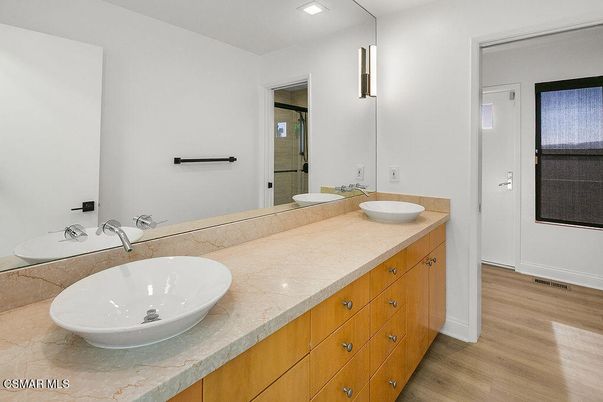 Bathroom, Dual Sink Vanities, Interior, Recessed Lighting, Wood Texture Flooring