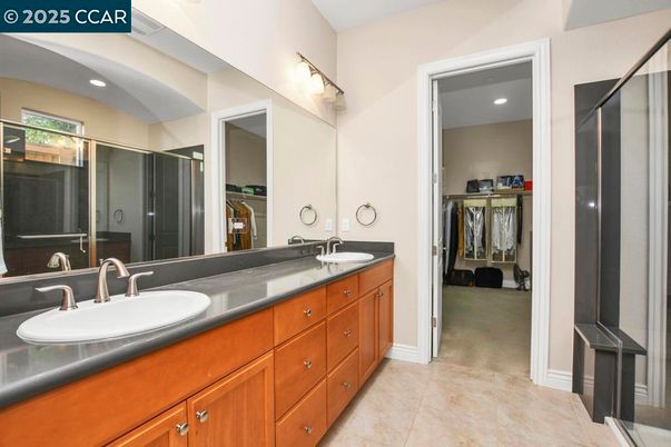 Bathroom, Dual Sink Vanities, Glass Shower, Interior, Recessed Lighting, Walk-in Closets