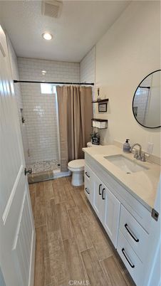 Bathroom, Dual Sink Vanities, Interior, Recessed Lighting, Wood Texture Flooring