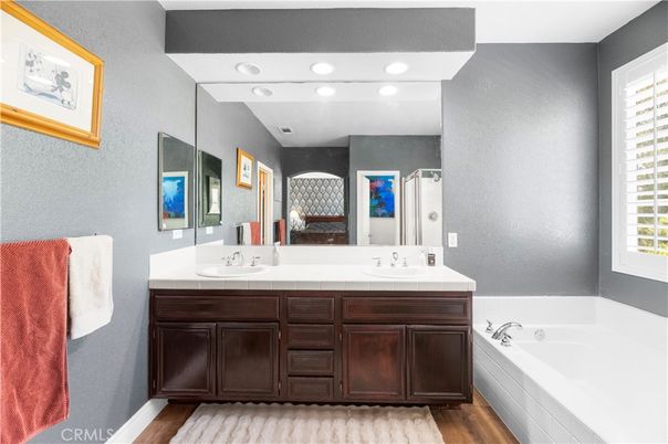 Bathroom, Dual Sink Vanities, Interior, Recessed Lighting, Wood Texture Flooring