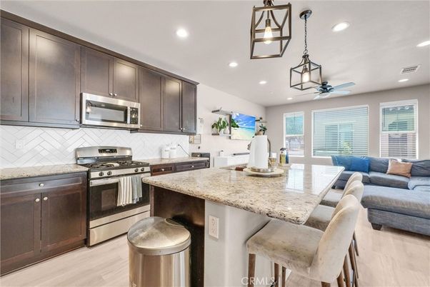 Interior, Kitchen, Living room, Pendant Lights, Recessed Lighting, Stainless Steel Appliances, Wood Texture Flooring
