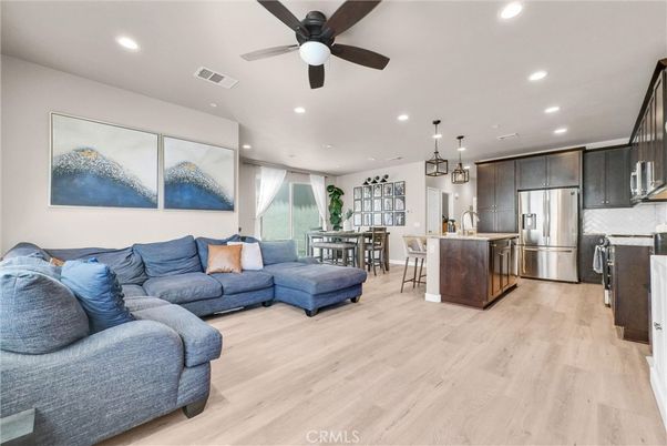 Dining room, Interior, Kitchen, Living room, Pendant Lights, Recessed Lighting, Stainless Steel Appliances, Wood Texture Flooring