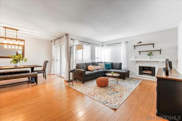 Dining room, Fireplace, Interior, Living room, Pendant Lights, Wood Texture Flooring