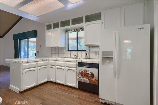 Interior, Kitchen, Tile Countertops, Wood Texture Flooring