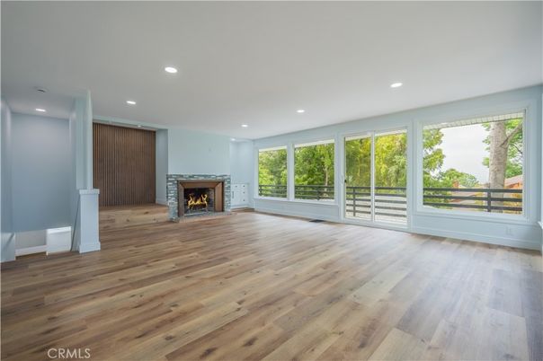 Empty room, Fireplace, Interior, Recessed Lighting, Wood Texture Flooring