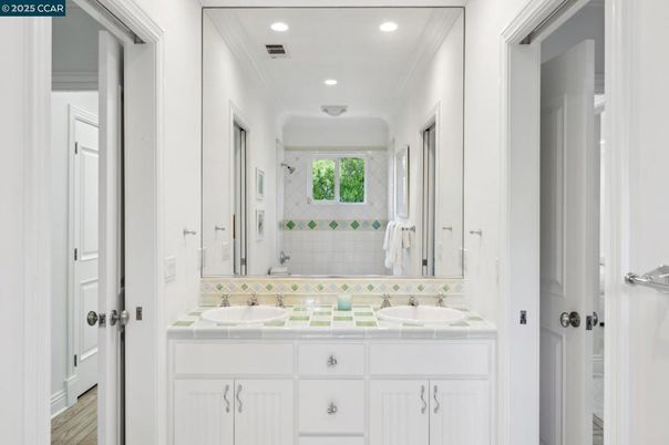 Bathroom, Dual Sink Vanities, Interior, Recessed Lighting, Tile Countertops, Wood Texture Flooring