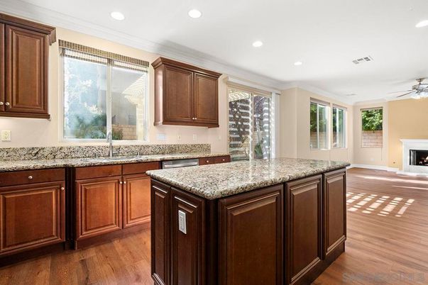Fireplace, Interior, Kitchen, Recessed Lighting, Wood Texture Flooring