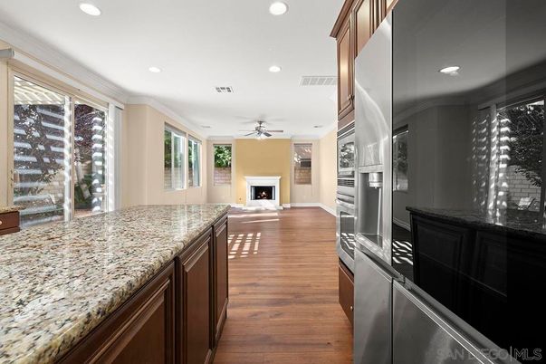 Fireplace, Interior, Kitchen, Recessed Lighting, Wood Texture Flooring