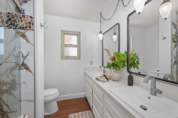 Bathroom, Dual Sink Vanities, Interior, Pendant Lights, Wood Texture Flooring
