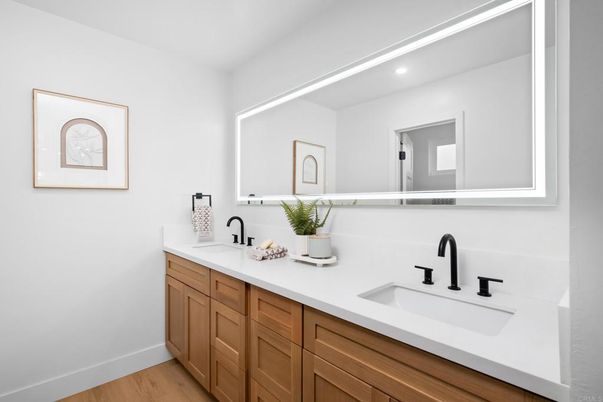 Bathroom, Dual Sink Vanities, Interior, Recessed Lighting, Wood Texture Flooring