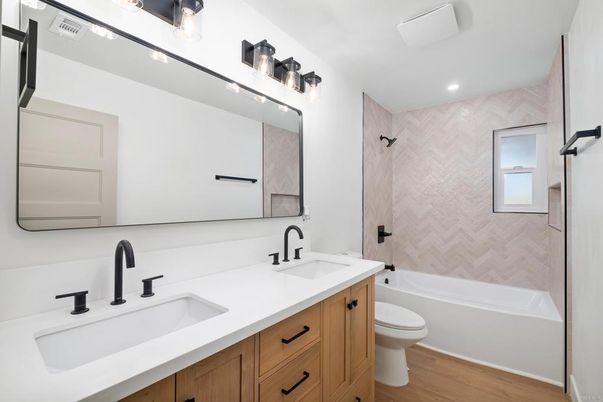 Bathroom, Dual Sink Vanities, Interior, Recessed Lighting, Wood Texture Flooring