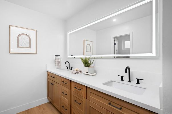 Bathroom, Dual Sink Vanities, Interior, Recessed Lighting, Wood Texture Flooring