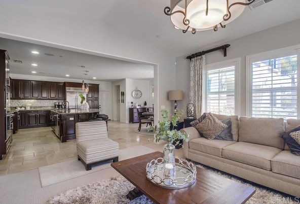 Chandelier, Dining room, Interior, Kitchen, Living room, Pendant Lights, Recessed Lighting, Stainless Steel Appliances