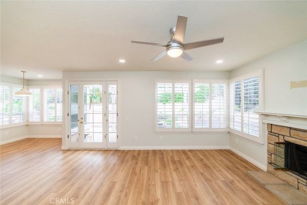 Empty room, Fireplace, Interior, Pendant Lights, Recessed Lighting, Wood Texture Flooring