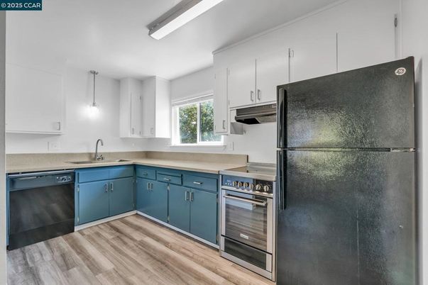 Interior, Kitchen, Pendant Lights, Stainless Steel Appliances, Wood Texture Flooring