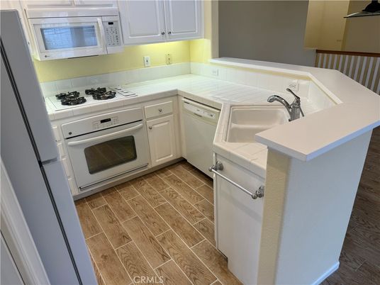 Interior, Kitchen, Tile Countertops, Wood Texture Flooring
