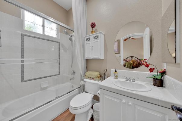 Bathroom, Glass Shower, Interior, Tile Countertops, Wood Texture Flooring