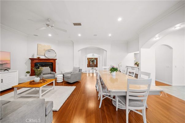 Dining room, Fireplace, Interior, Living room, Recessed Lighting, Wood Texture Flooring