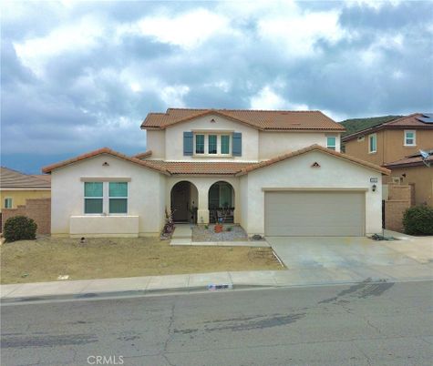 Attached, Exterior, Facade, Spanish Mediterranean