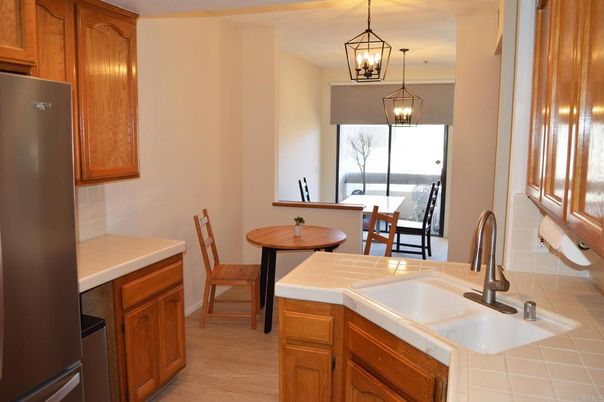 Dining room, Interior, Kitchen, Pendant Lights, Tile Countertops, Wood Texture Flooring