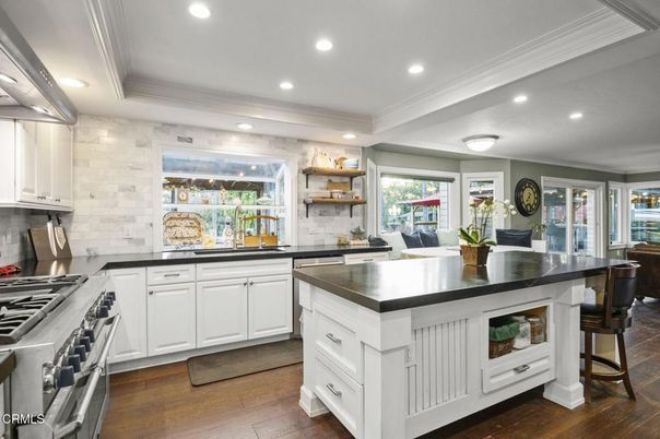 Dining room, Interior, Kitchen, Recessed Lighting, Stainless Steel Appliances, Wood Texture Flooring