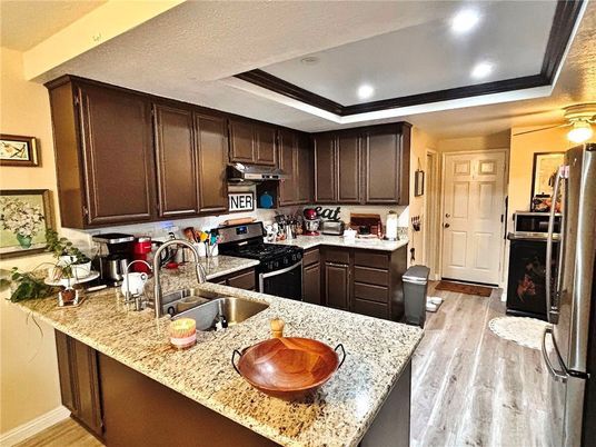 Interior, Kitchen, Recessed Lighting, Stainless Steel Appliances, Wood Texture Flooring