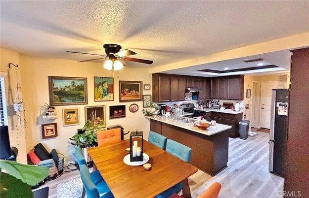 Dining room, Interior, Kitchen, Recessed Lighting, Stainless Steel Appliances, Wood Texture Flooring