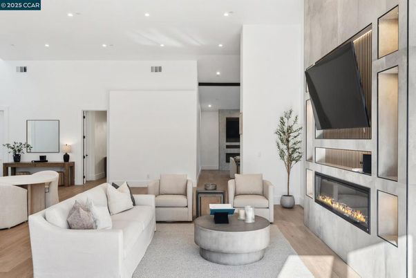 Dining room, Fireplace, Interior, Living room, Recessed Lighting, Wood Texture Flooring